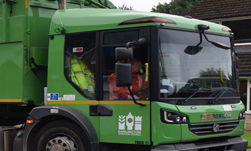 A Green Darlington Borough Council Refuse Truck