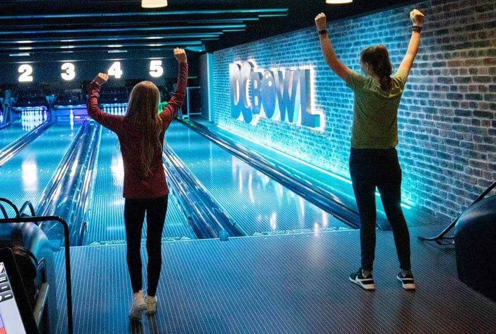 2 girls bowling at DC Bowl