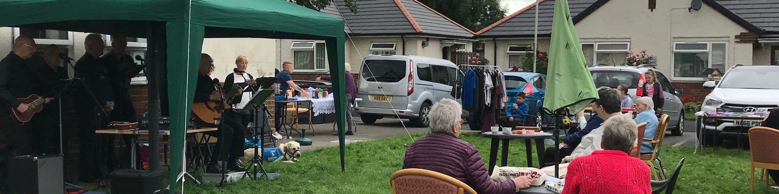 Residents enjoying a garden part