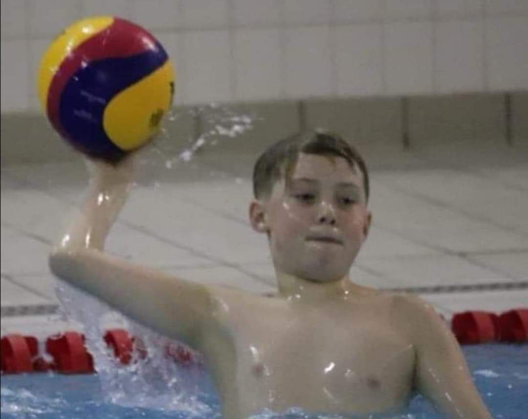 a child throwing a ball