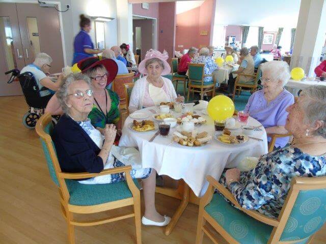 residents enjoying afternoon tea