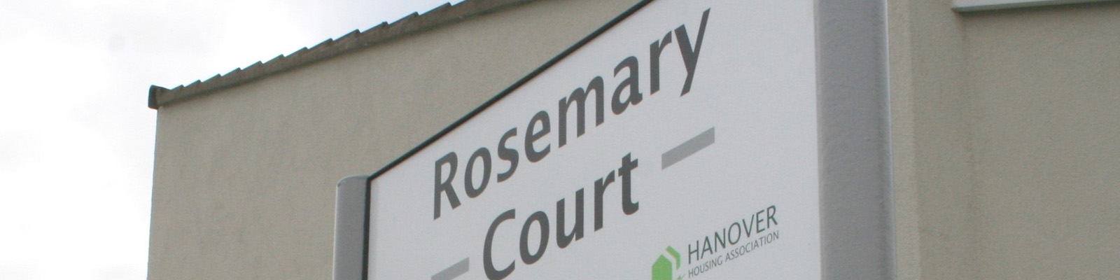 the front to Rosemary Court including its sign