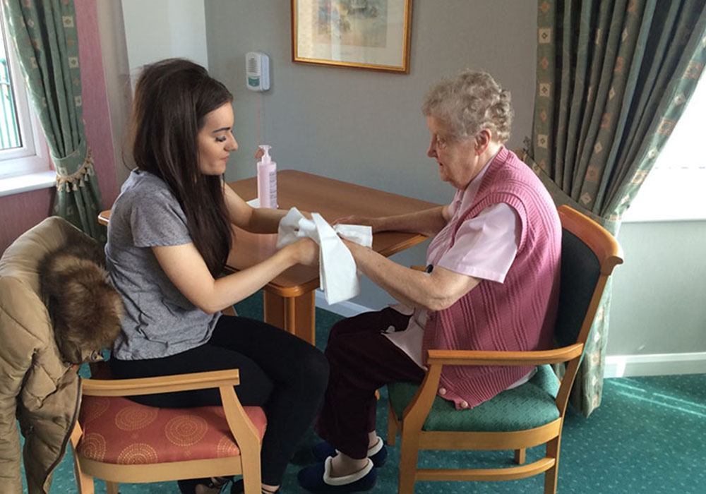 a resident enjoying beauty therapy