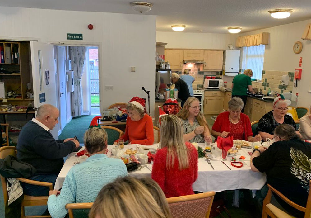 residents enjoying Christmas dinner