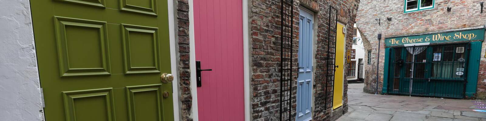 Colourful doors brighten up the yards