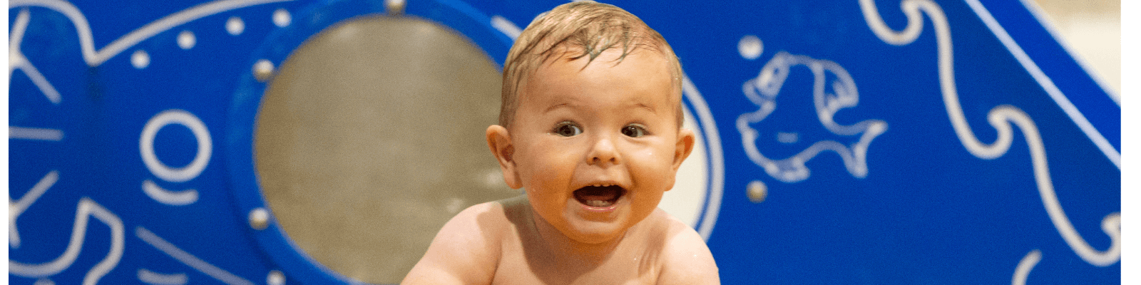 A toddler in the kids pool a the Dolphin Centre