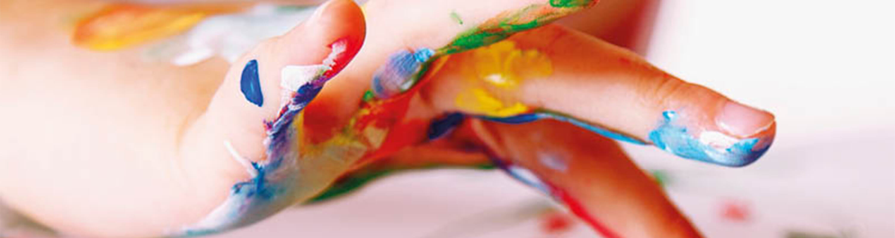 A child finger-painting
