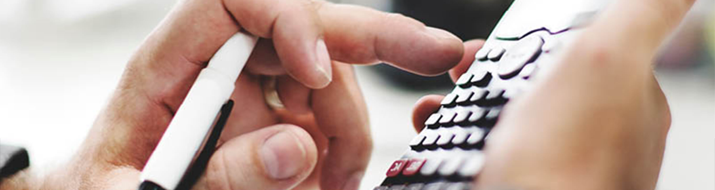 A man uses a calculator