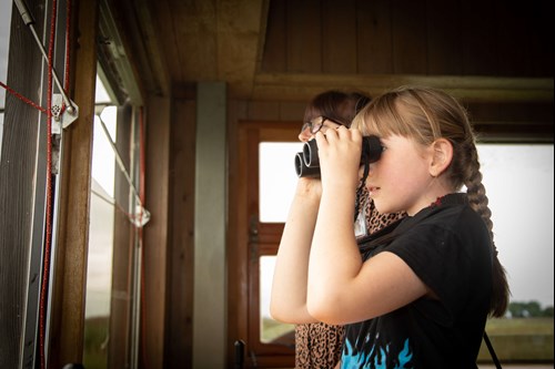 Girl birdwatching