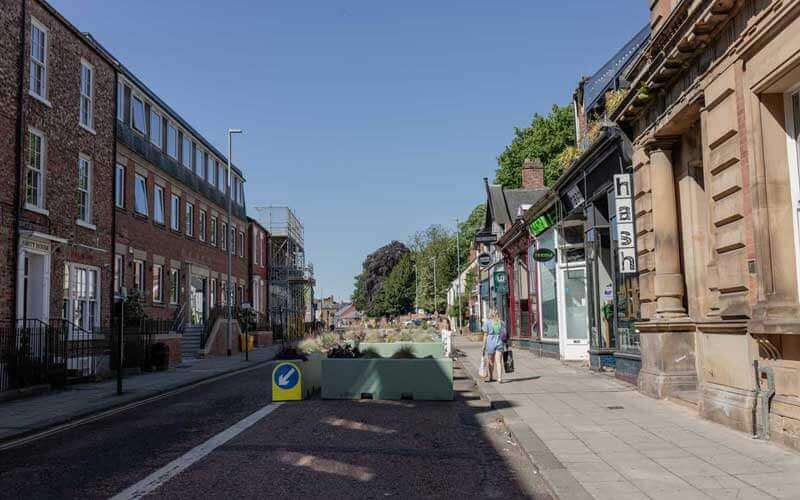 street with shops and building on each side