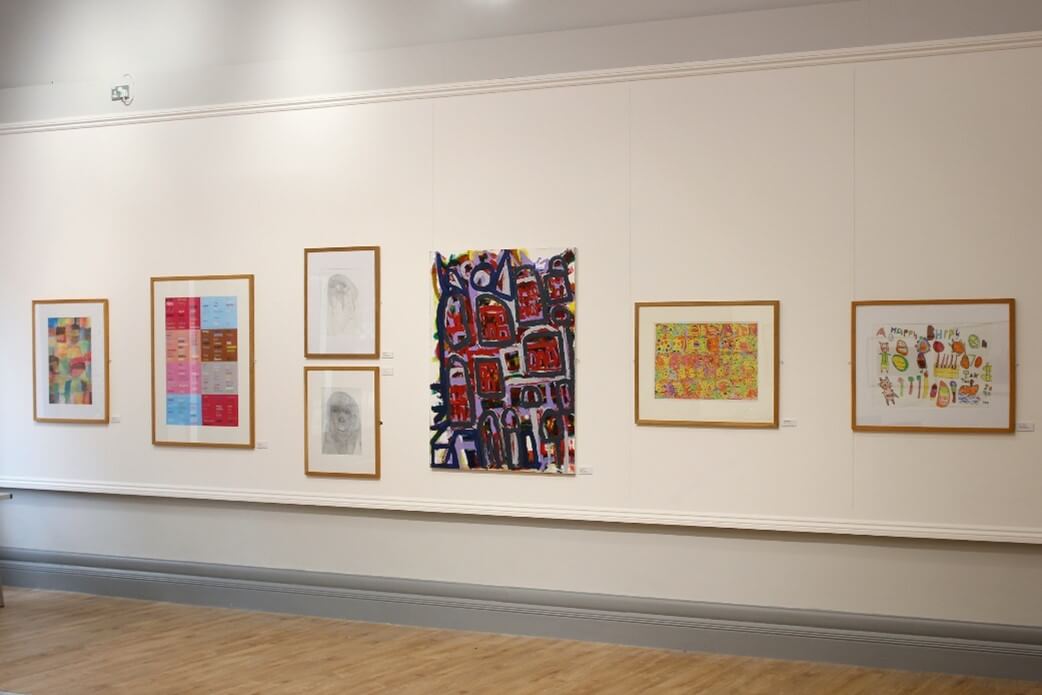 Pictures displayed on a wall