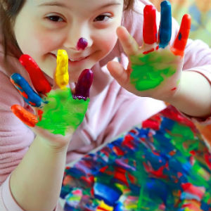 Child playing with paints