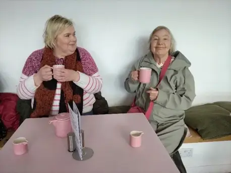 Two ladies having a cuppa