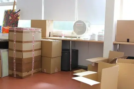 Packing boxes in an office