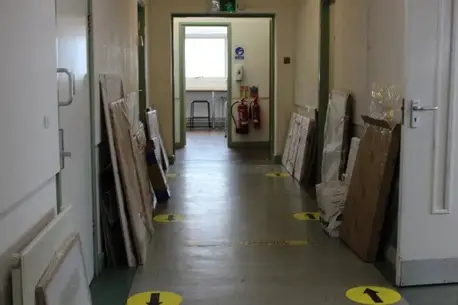 Empty corridor with packing boxes